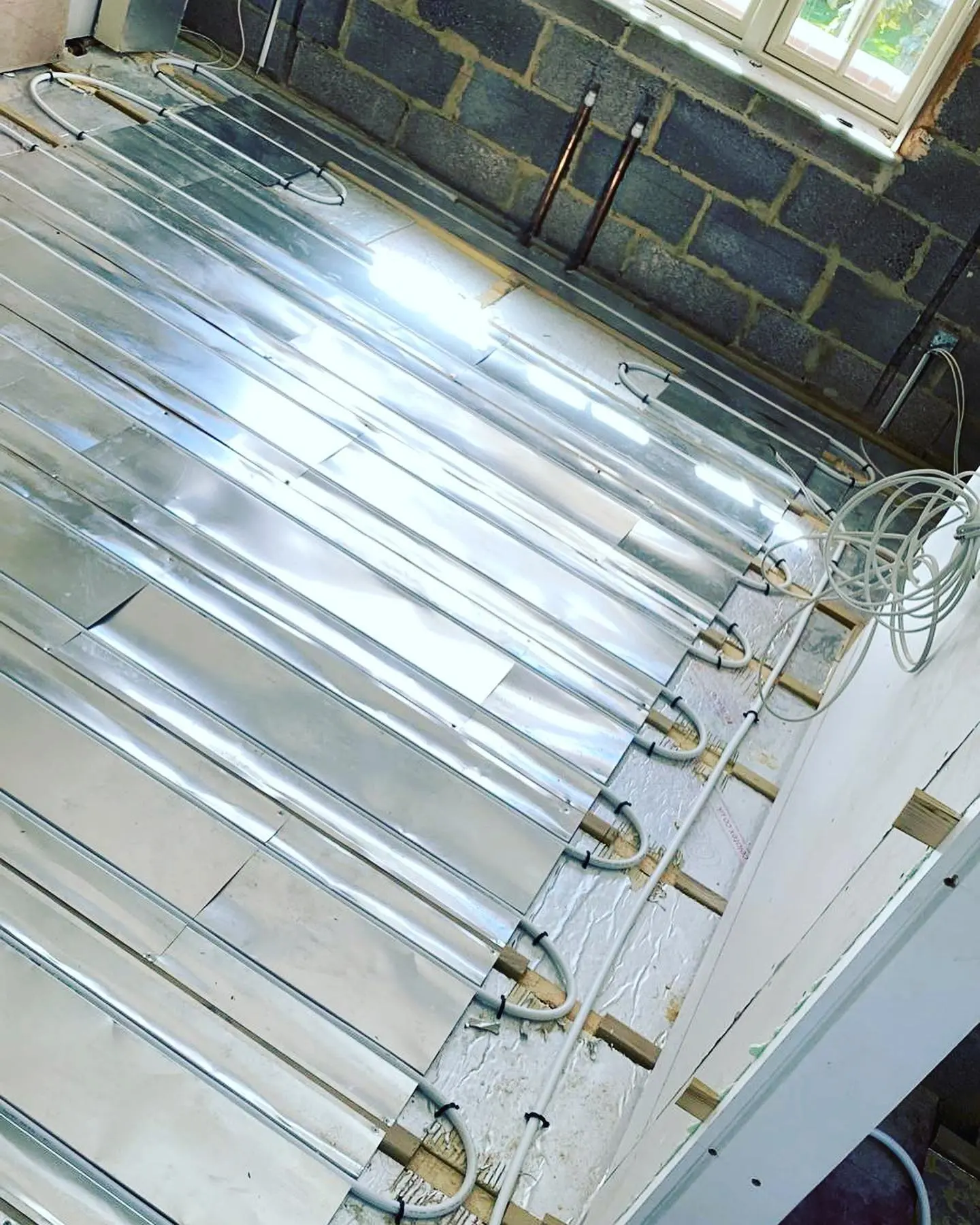 spreader plate underfloor heating system