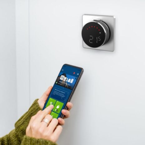 woman-regulating-heating-temperature-with-phone-an-2023-11-27-05-23-37-utc-1-2-scaled woman-regulating-heating-temperature-with-phone-an-2023-11-27-05-23-37-utc-1-2-scaled